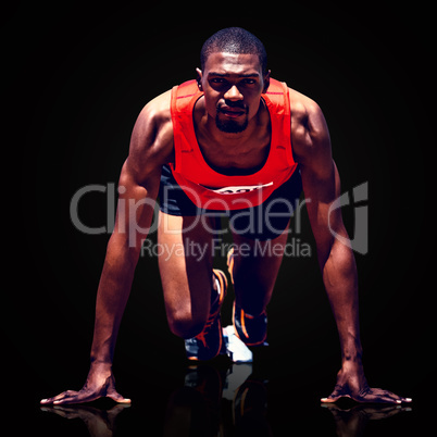 Composite image of athlete man in the starting block