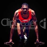 Composite image of athlete man in the starting block