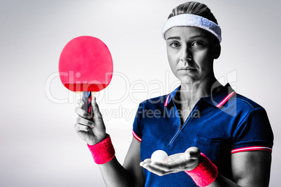 Composite image of female athlete is ready to play ping pong