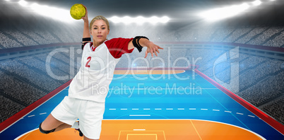 Sportswoman throwing a ball