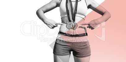 Composite image of sportswoman chest with medals