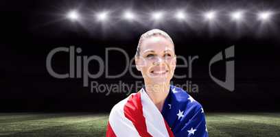 Composite image of portrait of american sportswoman is smiling