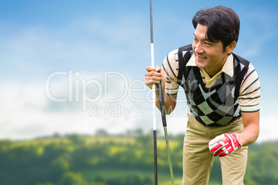 Man with golf equipment