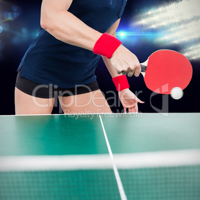 Composite image of ping pong player hitting the ball