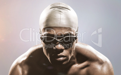 Composite image of swimmer ready to dive