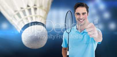 Composite image of portrait of badminton player showing thumbs u