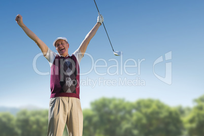 Golf player raising arms