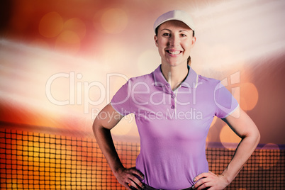 Composite image of sportswoman posing on black background