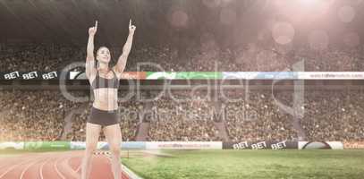 Composite image of female athlete raising fingers