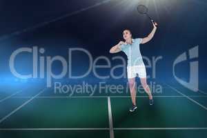 Composite image of pretty blonde playing badminton