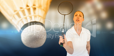 Composite image of female player playing badminton