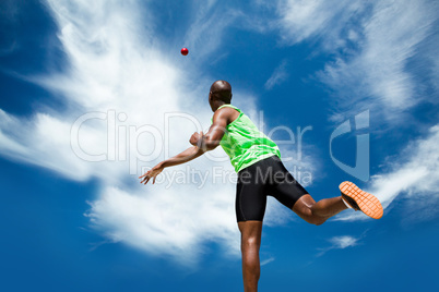 Composite image of rear view of sportsman throwing a shot