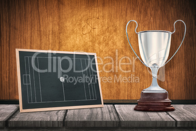 Composite image of focus on a trophy