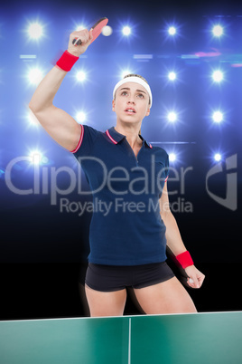 Composite image of female athlete winning a ping pong match