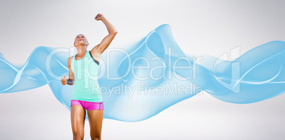 Composite image of sportswoman celebrating her victory