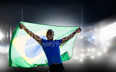Composite image of front view of brazilian sportsman is smiling