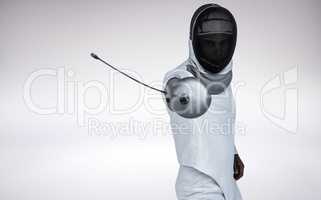 Composite image of man wearing fencing suit practicing with swor