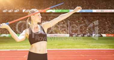 Composite image of front view of sportswoman practising javelin throw