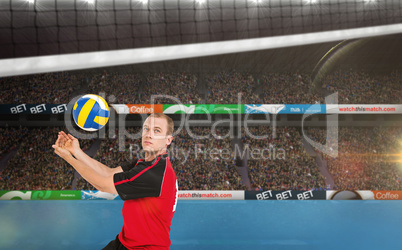 Composite image of sportsman posing while playing volleyball