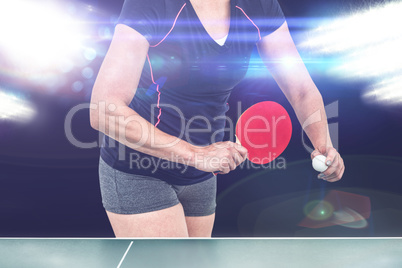 Composite image of female athlete playing table tennis