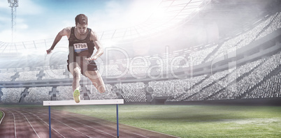 Composite image of sportsman practising hurdles