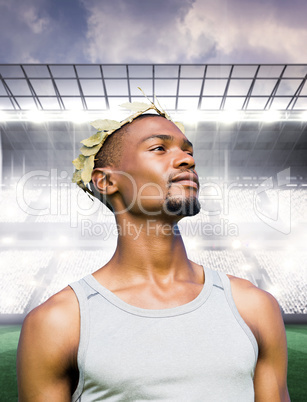Composite image of portrait of victorious sportsman