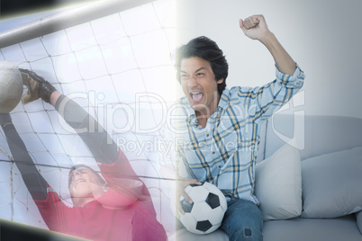 Composite image of man cheering soccer team during a match on te