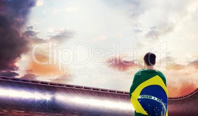 Composite image of rear view of brazilian sportsman