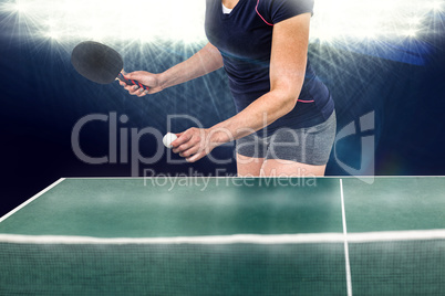 Composite image of female athlete playing table tennis