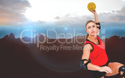 Female athlete throwing handball