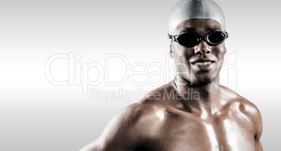 Composite image of swimmer standing with hand on hip