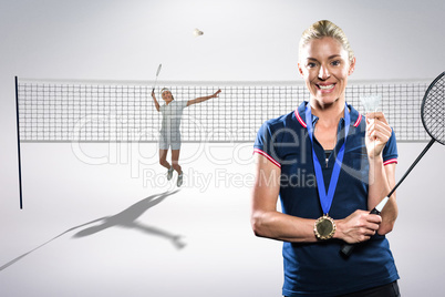 Composite image of badminton player posing with a medal