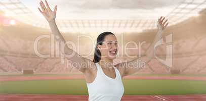 Composite image of female athlete posing after victory
