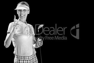 Smiling woman playing golf