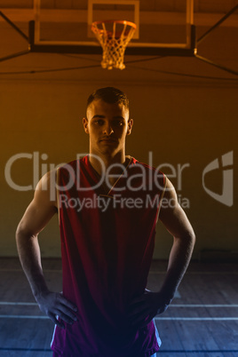 Portrait of a basketball player with his hands on his hips