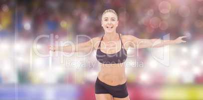Composite image of female athlete raising arms