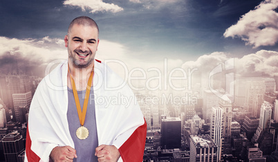 Composite image of athlete with olympic gold medal Composite image of athlete with olympic gold medal