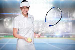 Composite image of female athlete holding a tennis racket and ball