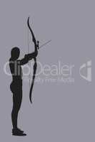 Composite image of sportswoman practicing archery on a white bac