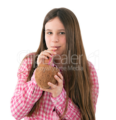 girl drinking from a coconut