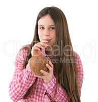 girl drinking from a coconut