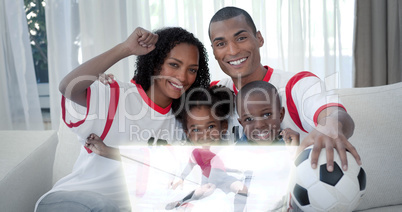 Composite image of family celebrating a football goal