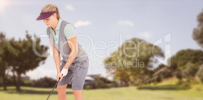 Composite image of pretty blonde playing golf