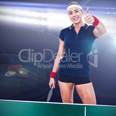 Composite image of female athlete posing with ping pong racket a