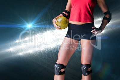 Composite image of female athlete with elbow pad holding handbal