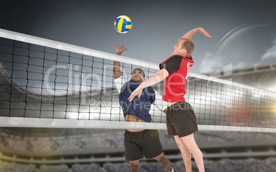 Composite image of sportsmen are playing volleyball