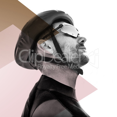 Composite image of man wearing a helmet