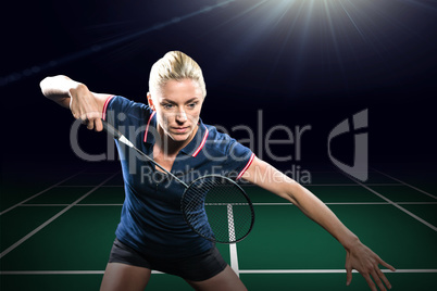 Composite image of badminton player playing badminton