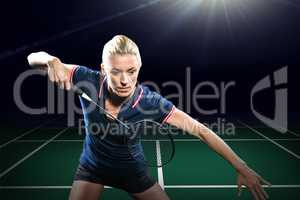 Composite image of badminton player playing badminton