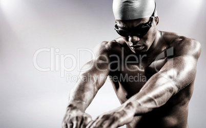 Composite image of swimmer ready to dive